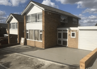 Replacing an old tarmac driveway in Gravesend, Kent, with silver grey resin bound surface dressing.