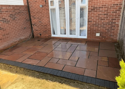 Patio installation in Maidstone in natural sandstone.
